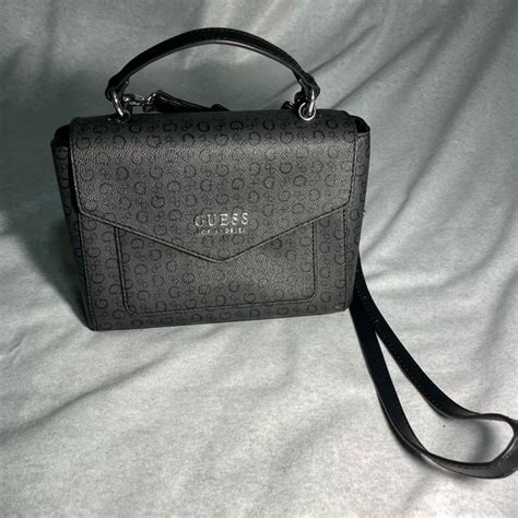 purse with g's all over it|g by guess bag.